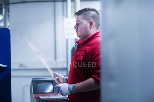 Man working at industrial plant — Stock Photo