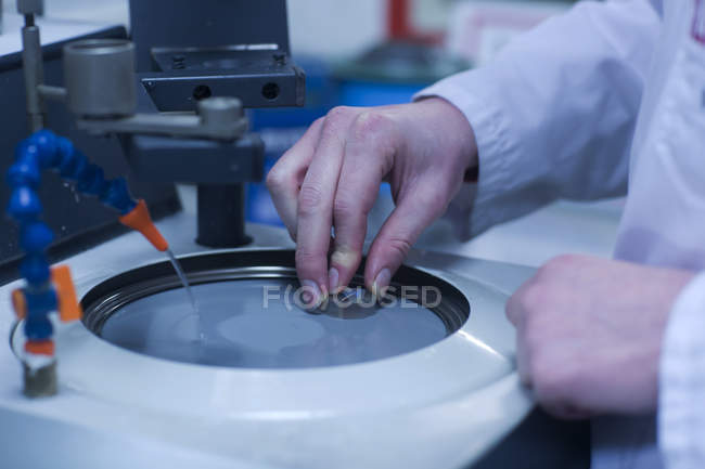 Woman working with industrial equipment — Stock Photo