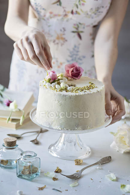 Woman Decorating Chiffon Cake Front View Sponge Cake Stock