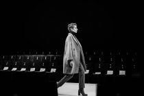 Model walking on stage — Stock Photo