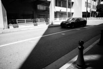 Modern coupe on street — Stock Photo
