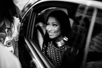 Nicki Minaj sitting in car after Balmain Show — Stock Photo