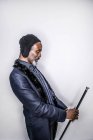 African man standing with cane — Stock Photo