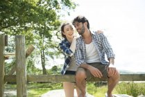 Man and woman happily chatting — Stock Photo