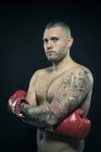 Portrait of tattooed boxer — Stock Photo