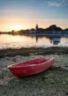 Landscape over low tide harbor with boats — Stock Photo