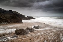 Lighthouse landscape with stormy sky — Stock Photo