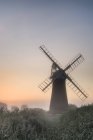 Windmill in stunning landscape — Stock Photo