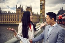 Couple arguing while looking at travel map — Stock Photo