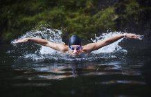 Confident young female swimmer — Stock Photo