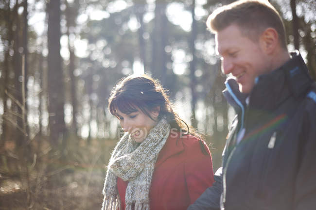 Couple on walk in woods — Stock Photo