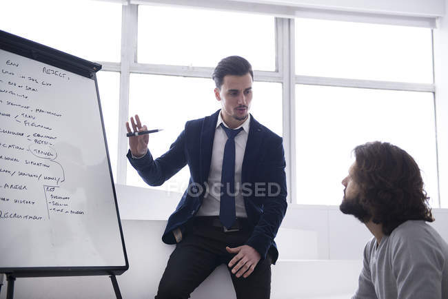 Colleagues discussing strategy — Stock Photo