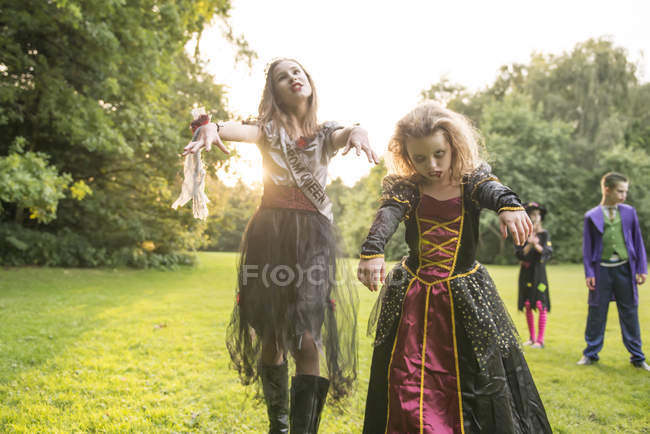 Children dressed in costumes for Halloween — Stock Photo