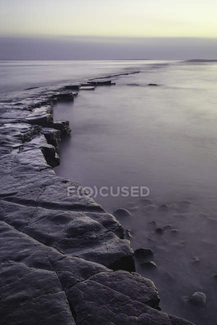 Закат над заливом Киммеридж — стоковое фото