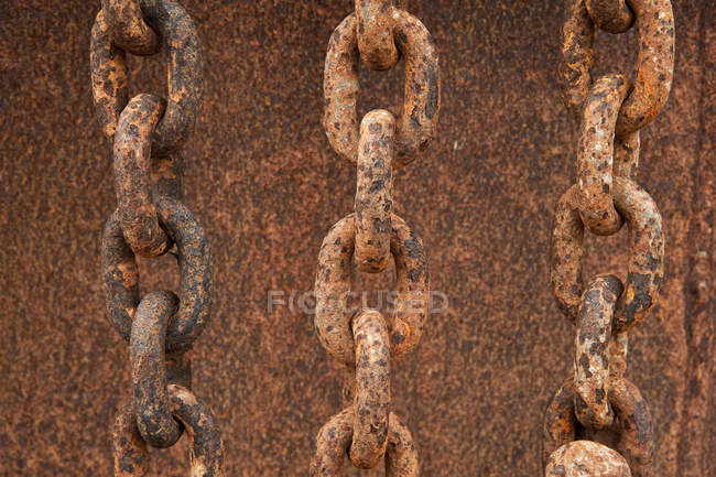 Worn rusty chains — Stock Photo