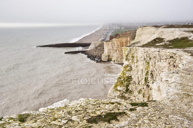 Sea town from top of nearby cliffs — Stock Photo
