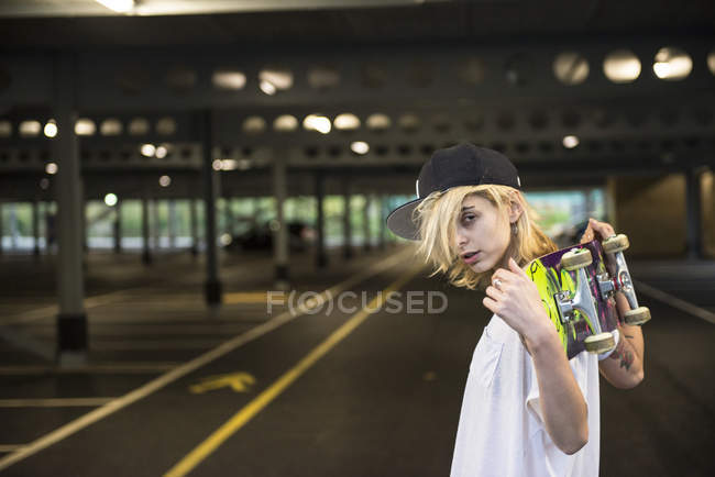 Young tattooed skater girl — Stock Photo