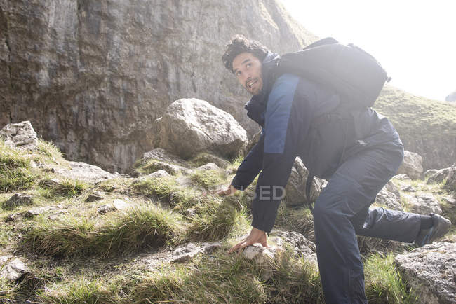 Mountaineer in rugged terrain. — Stock Photo