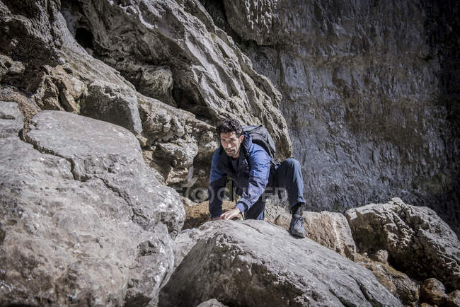 Mountaineer in rugged terrain. — Stock Photo