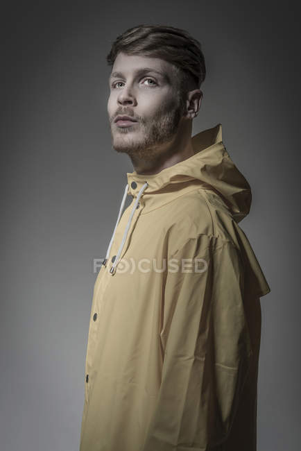 Man in a yellow windcheater — Stock Photo