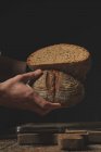 Baker cutting bread — Stock Photo