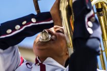 Marching band trombone player — Stock Photo