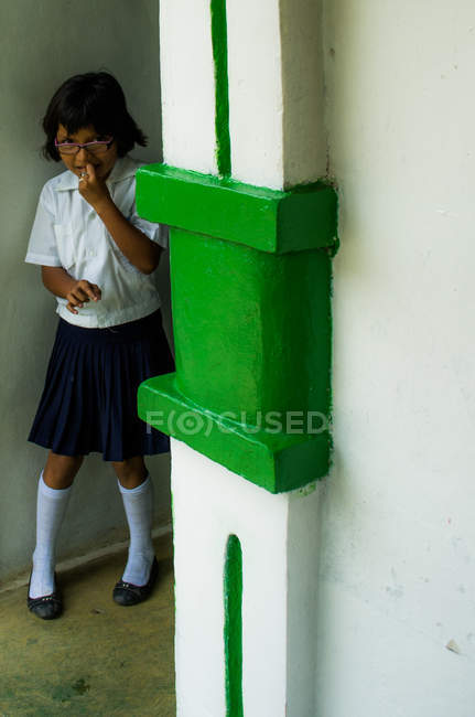 Shy school girl — Stock Photo