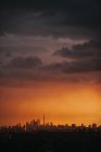 Sunset view on city skyline — Stock Photo