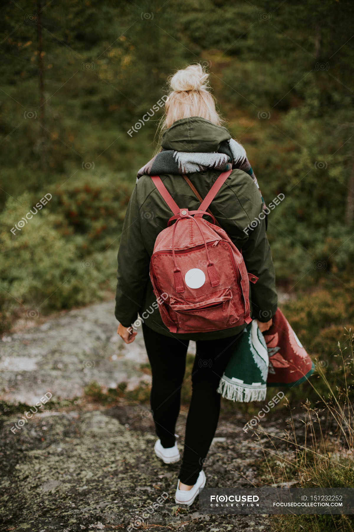 Female backpacker walking on mountain hills — outdoors, explore - Stock ...