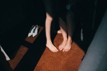 Barefoot legs of people — Stock Photo