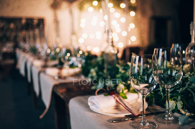 Served table with glasses — Stock Photo
