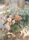Rustic floral arrangement — Stock Photo