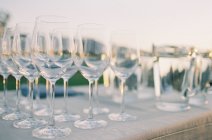 Rows of cocktail glasses — Stock Photo