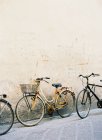 Vintage bicycles parked — Stock Photo