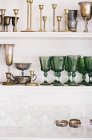 Vintage glasses and candlesticks — Stock Photo