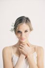 Woman with white flowers in hair — Stock Photo