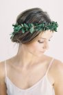 Woman in floral wreath — Stock Photo
