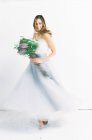 Woman in tulle dress turning around — Stock Photo