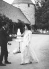 Groom inviting bride to dance outdoor — Stock Photo