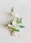 Elegant wedding flowers with ribbon — Stock Photo