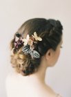 Hair with weaven in flowers — Stock Photo