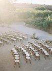 Rows of chairs set outside — Stock Photo