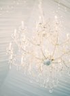 Chandelier lighting in room — Stock Photo