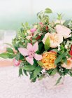 Fresh cut bouquet with peonies — Stock Photo