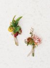 Boutonnieres florales frescos - foto de stock