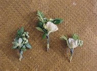 Fresh floral boutonnieres — Stock Photo