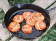 Stewed tomatoes in frying pan — Stock Photo