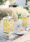 Fresh lemonade in patterned jars — Stock Photo