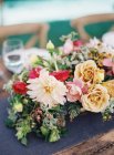 Bouquet on setting table — Stock Photo