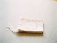 Cotton napkin with monogram — Stock Photo